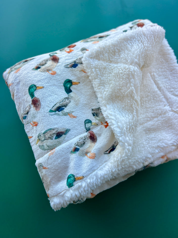 Manta acurrucada de pata de gallo rosa